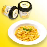 Yopokki Ryžių Virtinukai (Topokki) – auksinių svogūnų ir sviesto skonio 120g - YoungPoong